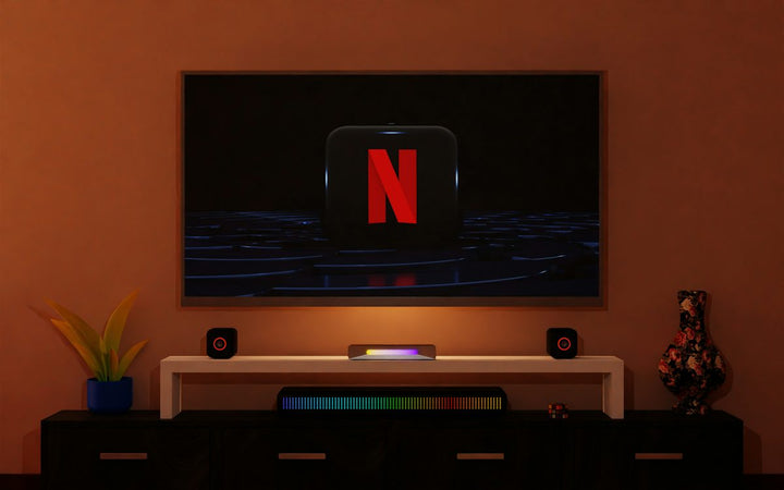 a flat screen tv sitting on top of a entertainment center — illustrative stock photo