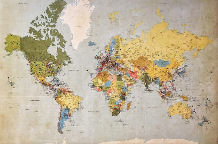 blue, green, and yellow world map — illustrative stock photo