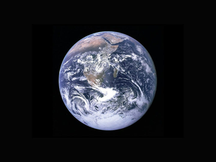 Earth with clouds above the African continent — illustrative stock photo